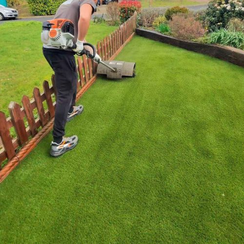 Artificial Grass Lawn in Sidcup being Powerbrushed
